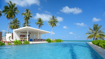 The pool bar is next to beautiful swimming poolのeditorial素材