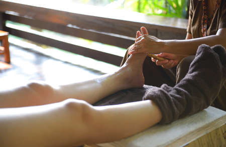 The women massage her foot for thai spa foot massageの写真素材