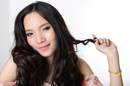 portrait of beautiful smiling healthy asian long hair womanの写真素材