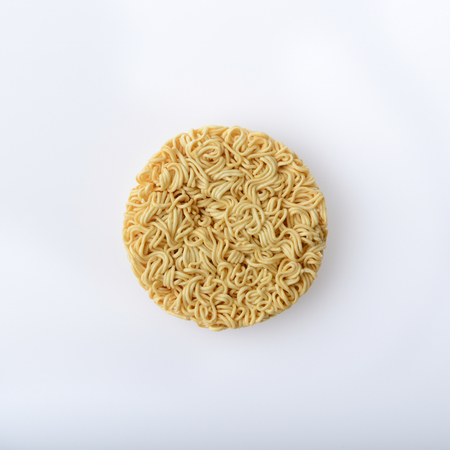 top view of instant noodles on white backgroundの写真素材