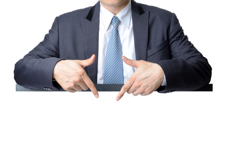 businessman pointing at blank white sign isolated on white background ,business conceptの写真素材