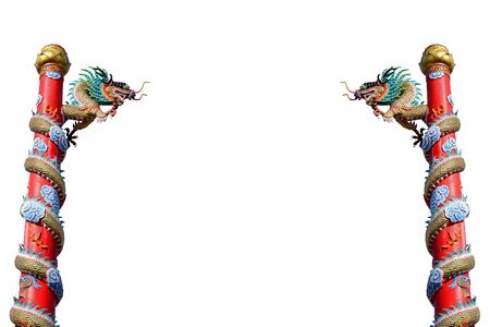 Chinese style dual golden dragon statue isolated on white backgroundの写真素材