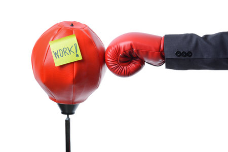businessman fist punch red punching bag , business conceptの写真素材