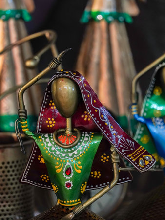 selective focus on the small metal statue of a traditional indian female dancerの写真素材