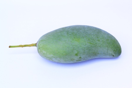 Green mango isolated on white backgroundの写真素材