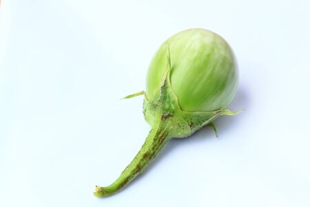 Green eggplant on white background の写真素材