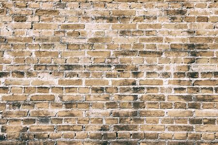 Texture of orange old wall brick structureの写真素材
