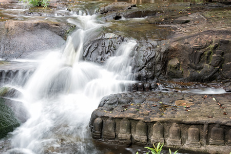 Kbal Spean the mystery waterfall on Kulen mountains range of the ancient Khmer empire in Siem Reap province of Cambodiaの写真素材