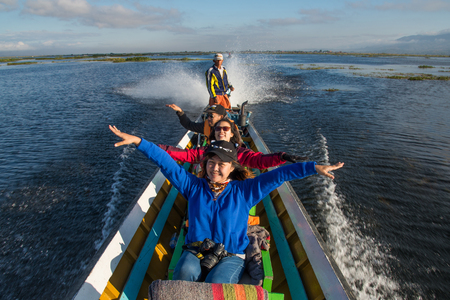 Tourist travel by local boat to visit the floating village of Intha people in Inle lake of Shan state of Myanmar-18 december 2016のeditorial素材