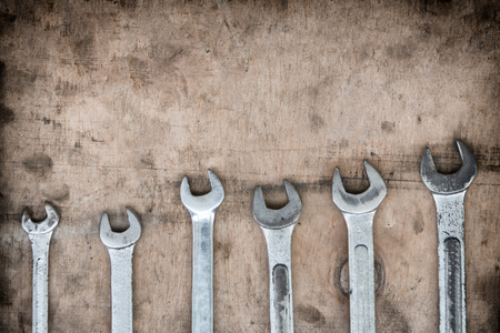 wrenches on garage wall, set of wrenches handy industrial tool,old wrenches in mechanic workshop,handy tool for motor vehicle mechanic use to fix motorcycle and carの写真素材