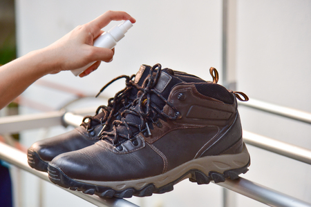 stinky hiking boot.Process of cleaning shoesの写真素材