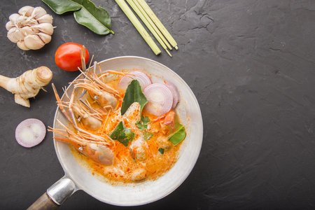 Tom yum kung or tom yam kung  is a type of hot and sour famouse food in Lao and Thai soup,usually cooked with shrimp.Tom yum has its origin in Laos and Thailand foodの写真素材