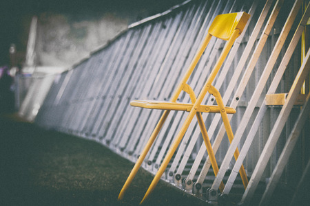 abstract lonly chair outdoor. Loneliness, estrangement, alienation concept.の写真素材