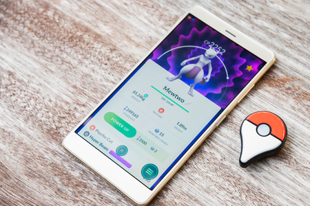 pokemon go event Mewtwo raid boss catched by pokemon trainer in japan event.Release legendary pokemon for player to catch in pokemon go mobile game around the world on 28 November 2017のeditorial素材