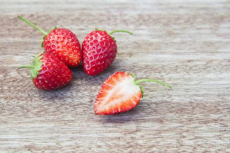 Fresh strawberries on wooden table,Red strewberry prepatation to make Strawberry Juice.Healthy and delicious organic fruit の写真素材
