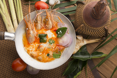 Tom yum kung or tom yam kung  is a type of hot and sour famouse food in Lao and Thai soup,usually cooked with shrimp.Tom yum has its origin in Laos and Thailand foodの写真素材