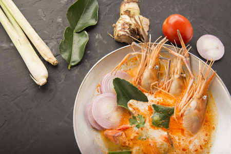 Tom yum kung or tom yam kung  is a type of hot and sour famouse food in Lao and Thai soup,usually cooked with shrimp.Tom yum has its origin in Laos and Thailand foodの写真素材