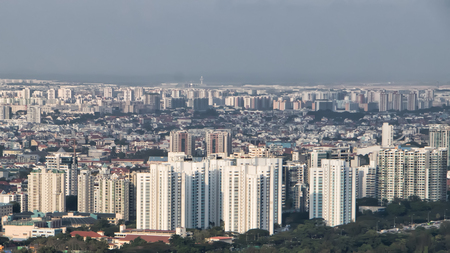 Singapore cityscape. aerial view of buildings in daytime.Haze is caused by the forest fire and burning of plantation in Indonesiaのeditorial素材