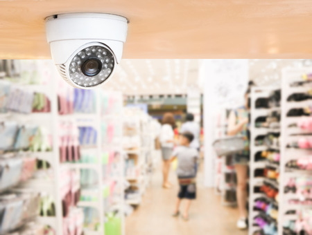 CCTV system security inside of stationery store.Surveillance camera installed on ceiling to monitor for protection customer in grocery shopの写真素材