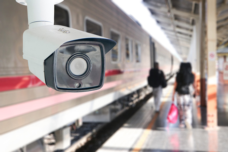 CCTV surveillance camera at railway station.Security system camera for protecting people from crime.Privacy monitor equipment in for police monitoring people in subway station.の写真素材