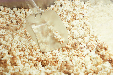 Popcorn texture.Salted popcorn in plastic box ready for sellの写真素材