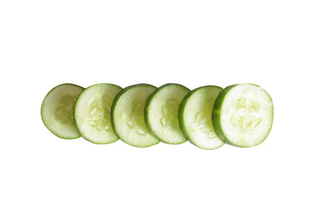 Fresh Cucumber isolated on white background with clipping path.Sliced cucumber sectionの写真素材
