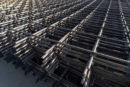 The rebar is bonded with steel wire for use as a construction infrastructure. Which part of the rebar has rusted due to chemical reactions.の写真素材