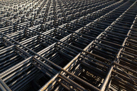 The rebar is bonded with steel wire for use as a construction infrastructure. Which part of the rebar has rusted due to chemical reactions.の写真素材