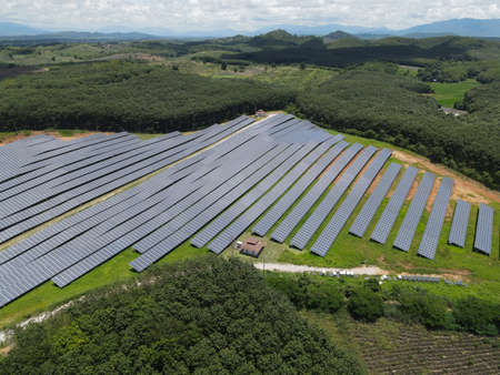 Solar panels use sunlight as a source of energy to generate direct current electricityの写真素材