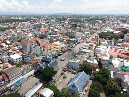 Aerial view from a drone that shows the border town of Mae Sai District, Thailand, And international immigration Tachileik District Of Myanmarの写真素材