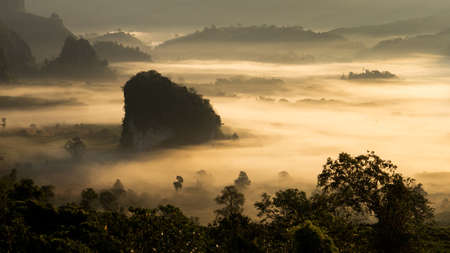 Phu langka forest park, Pha Chang Noi, Pong district,Phayao Thailand.Morning mist Covered the mountain while the sunrise was shining in winter.の写真素材