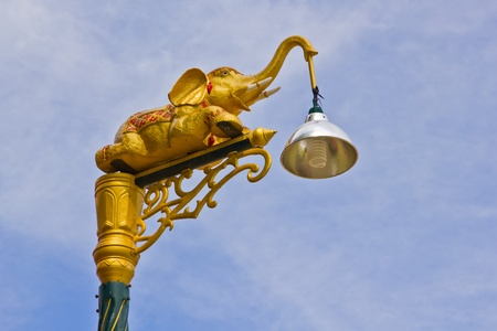 Elephant lamp on sky background の写真素材