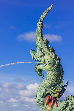The head great parent NAK statue spray water at Songkhla Thailandの写真素材