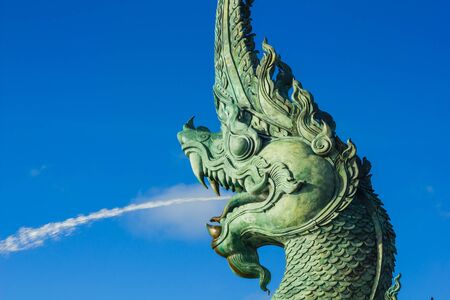The head great parent NAK statue spray water at Songkhla Thailandの写真素材
