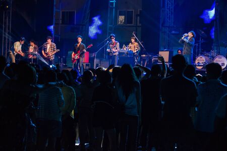 HUA HIN, THAILAND - DECEMBER 31 : Lead singer of Musketeers rock band performs live concert during Hua Hin Music Countdown 2013 on December 31, 2012 in Hua Hin, Prachuapkhirikhan, Thailandのeditorial素材