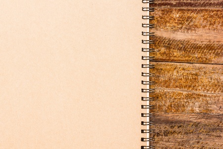 Gray notebook on wooden table
