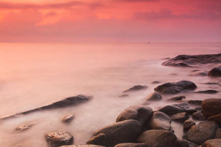 Colorful sunrise of the sea shoreの写真素材