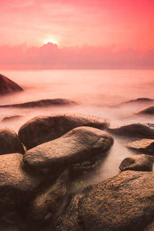 Colorful sunrise of the sea shoreの写真素材
