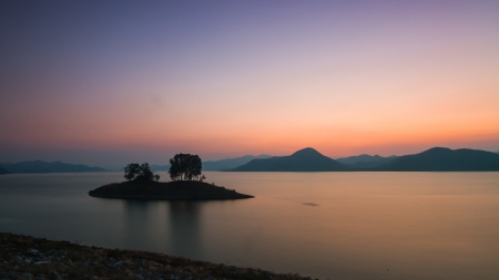 Colorful twilight dam and mountain backgroundの写真素材
