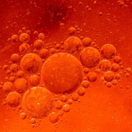 Oil Droplets on a water surfaceの写真素材