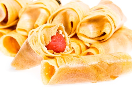 Rolled of Tokyo Pancake Sausage on white backgroundの写真素材