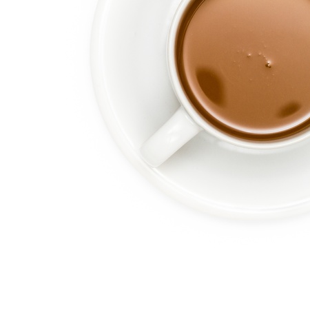 Top view of coffee in cup on white backgroundの写真素材