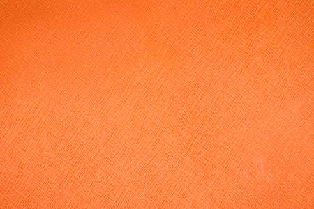 Orange textured leather backgroundの写真素材