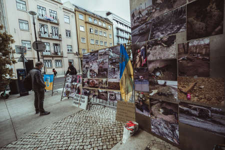 Lisbon, Portugal - April 6, 2022: a protest rally following the war crimes in Bucha: man is...