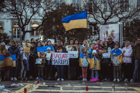 Lisbon, Portugal - April 20, 2022: protest rally dedicated to saving the city of Mariupol which was attacked and destroyed by Russian militaries during the incursion on Ukraine; the row of protestersのeditorial素材
