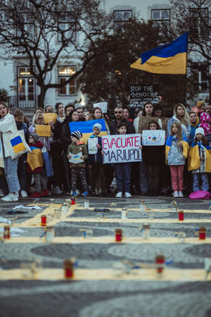 Lisbon, Portugal - April 20, 2022: a vertical shot of a protest manifestation dedicated to saving the city of Mariupol which was almost destroyed by Russian militaries during the incursion on Ukraineのeditorial素材