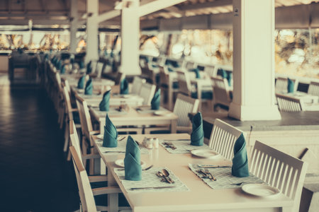 Selective focus point on Table and chair in restaurant - Vintage Filterの写真素材