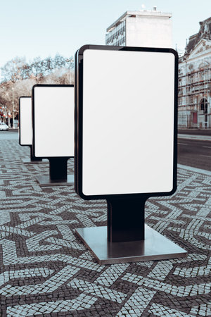 Series of blank digital billboards mockup in an urban outdoor setting, placed along a patterned...
