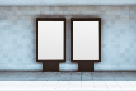 Minimal modern interior with two blank vertical advertising lightboxes on tiled wall, clean...
