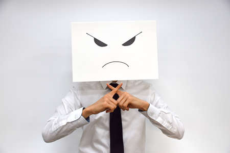 Facial expression of a person made of paperの写真素材